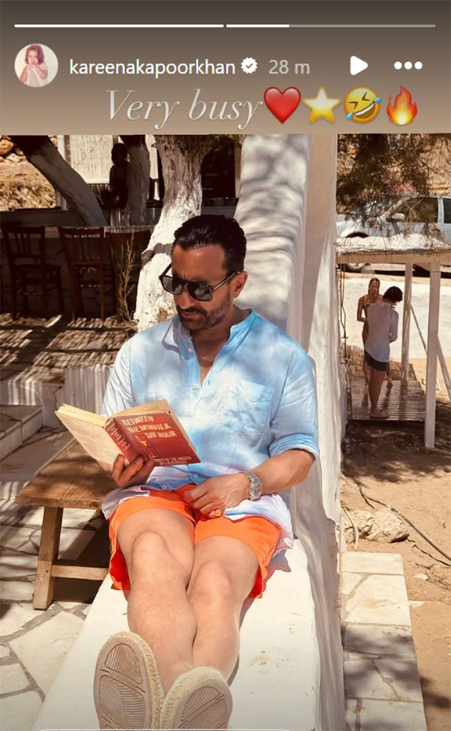 Saif Ali Khan totally focused on reading a book